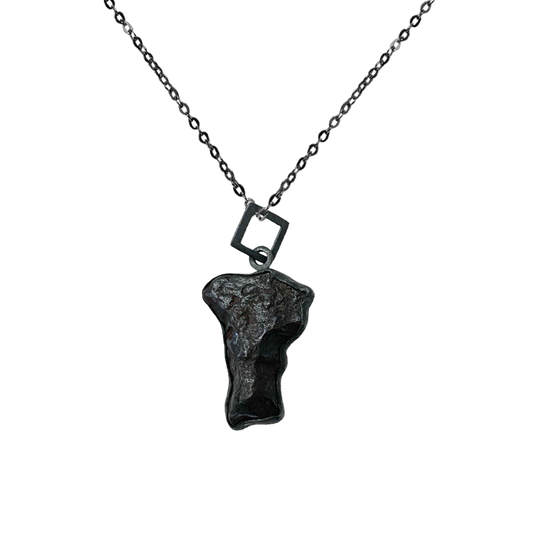 Irregular meteorite beveled pendant with square chain.
