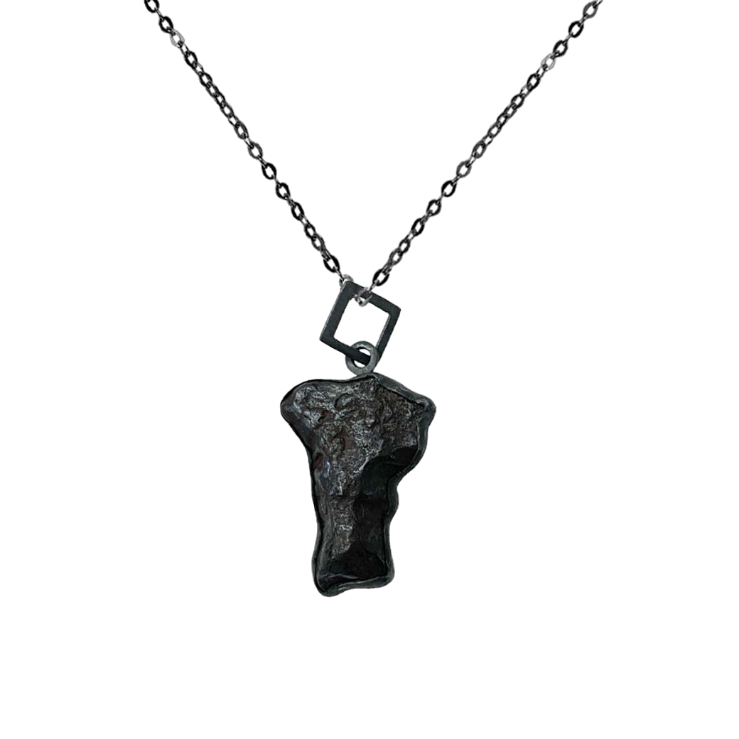 Irregular meteorite beveled pendant with square chain.