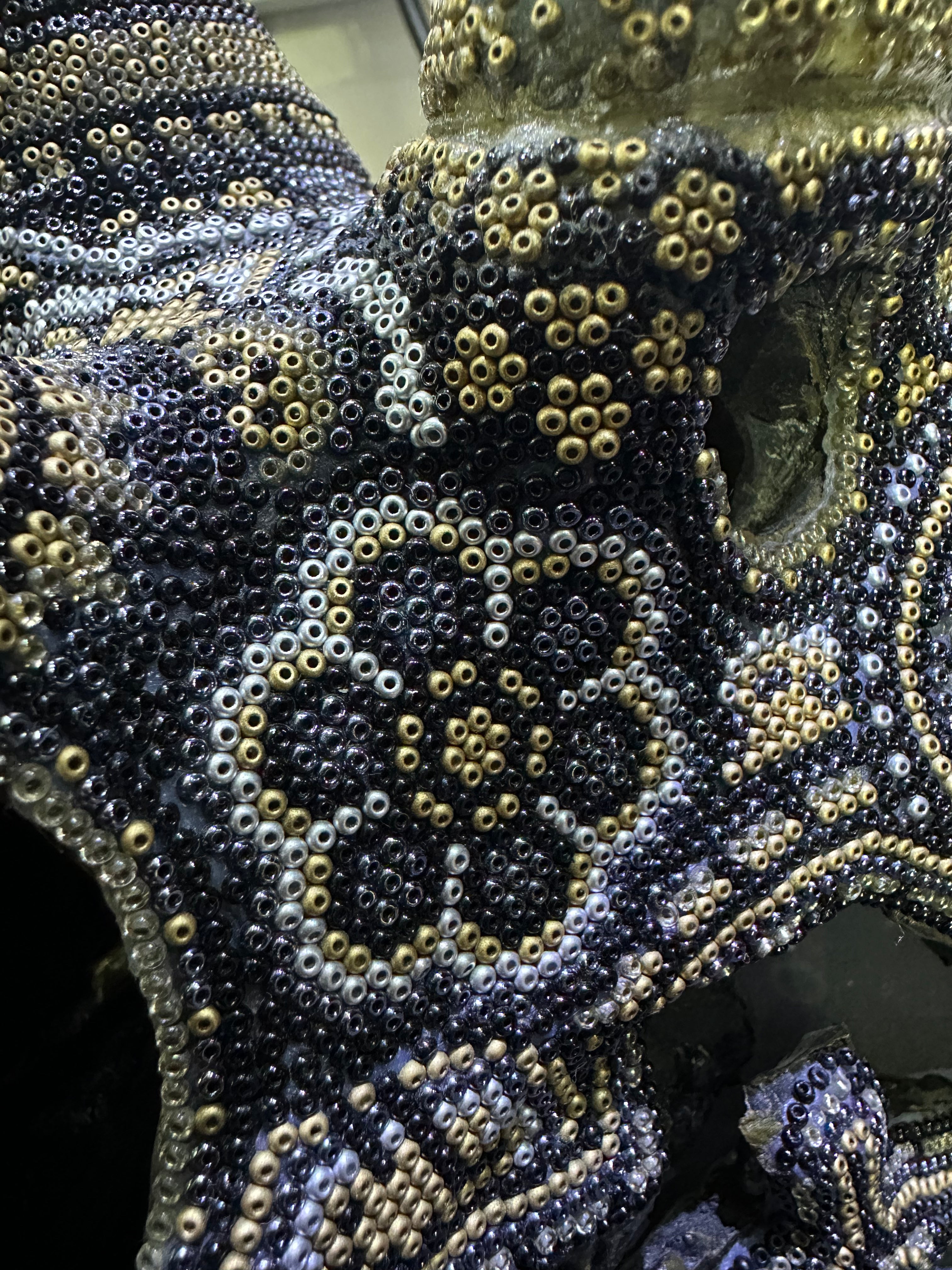 Imitation Fossil with Huichol decorations