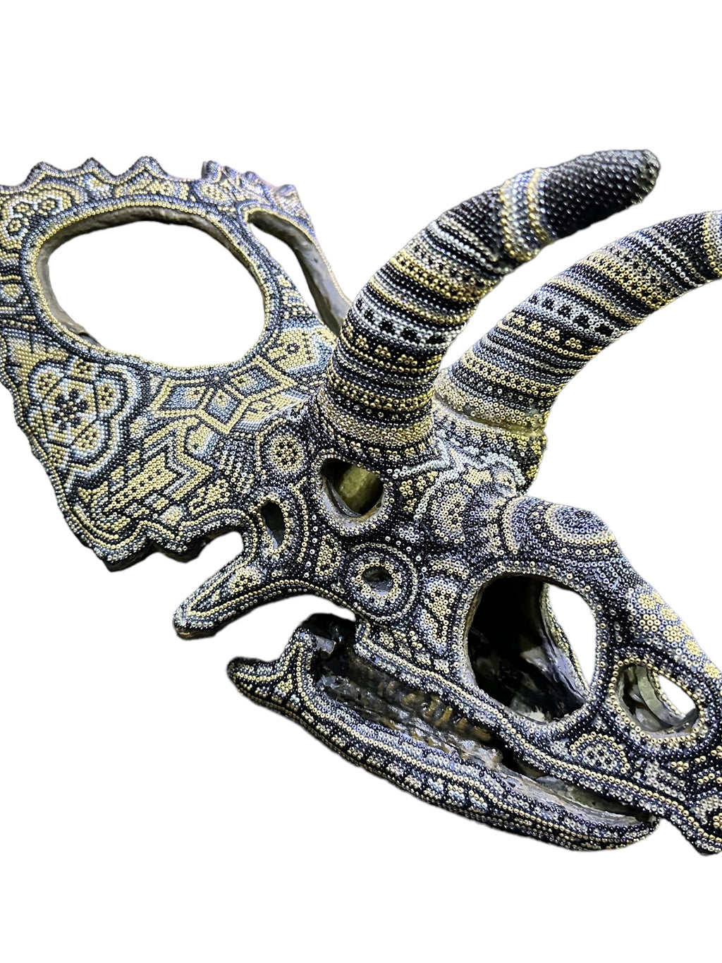 Imitation Fossil with Huichol decorations