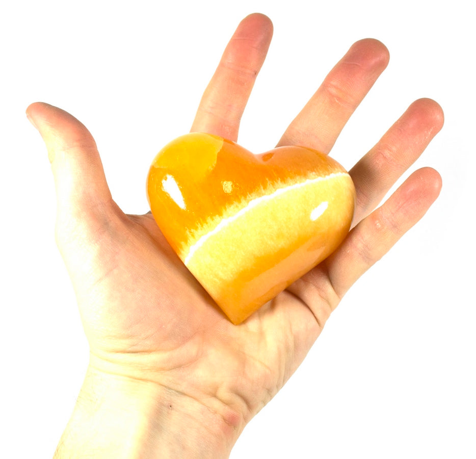 Orange calcite heart 4 cm tall